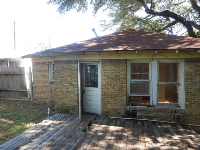 exterior space featuring a wooden deck