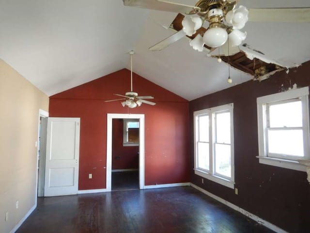 spare room featuring high vaulted ceiling, wood-type flooring, and ceiling fan