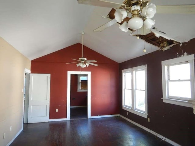6636 Ave P, Houston, TX 77011 - unfurnished room featuring lofted ceiling, baseboards, wood finished floors, and a chandelier