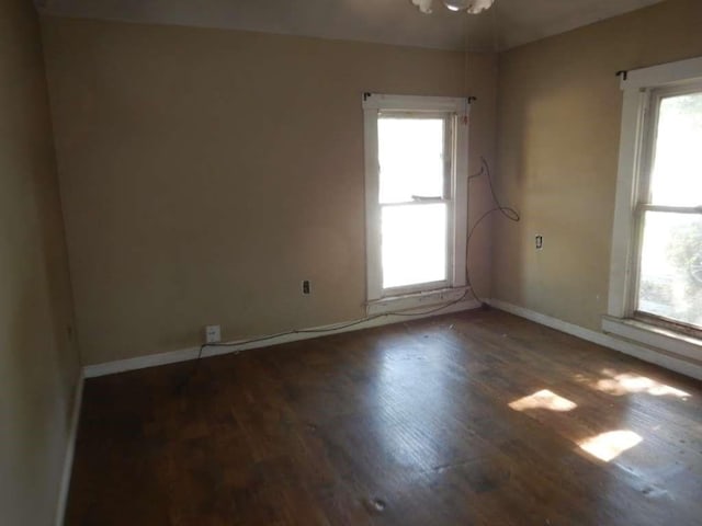 6636 Ave P, Houston, TX 77011 - unfurnished room with wood finished floors and baseboards