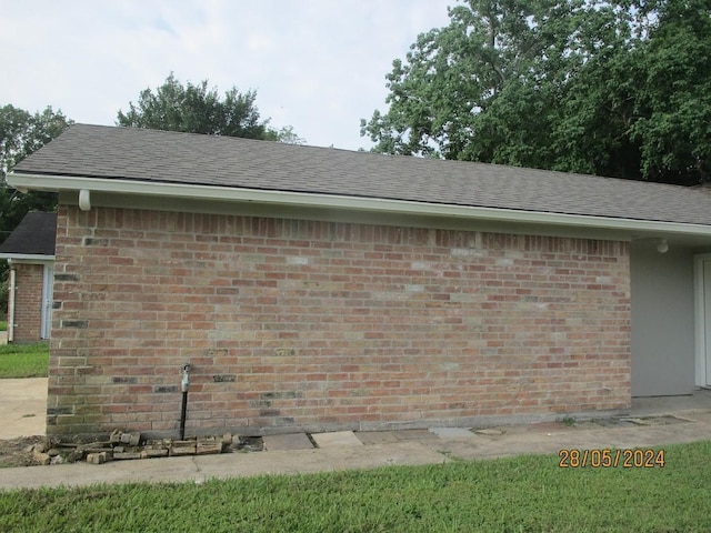 12515 Cooperstown Dr, Houston, TX 77089 - view of property exterior with brick siding and roof with shingles