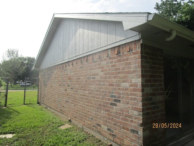 12515 Cooperstown Dr, Houston, TX 77089 - view of side of property featuring brick siding, a lawn, and crawl space