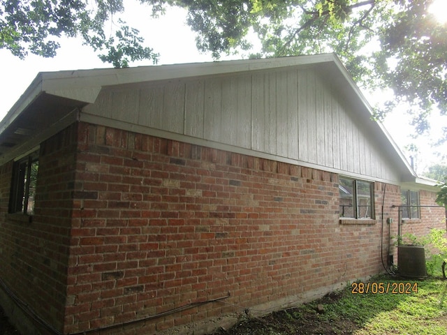 view of property exterior featuring central AC unit