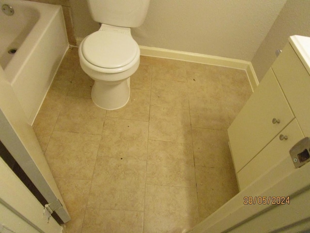 12515 Cooperstown Dr, Houston, TX 77089 - bathroom with toilet, baseboards, vanity, and tile patterned floors