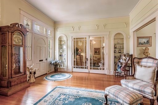 foyer entrance with hardwood / wood-style flooring