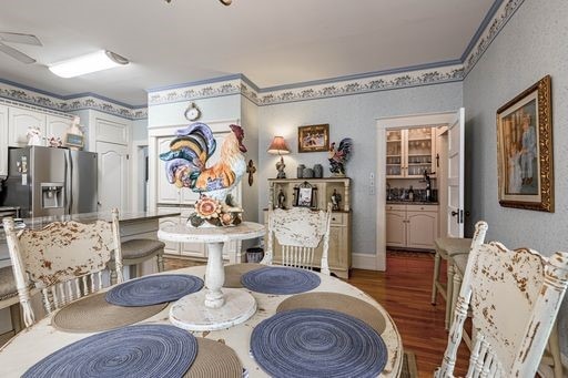 dining area featuring hardwood / wood-style floors