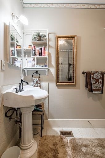 bathroom featuring tile floors