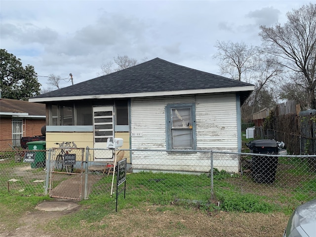 bungalow with a front yard