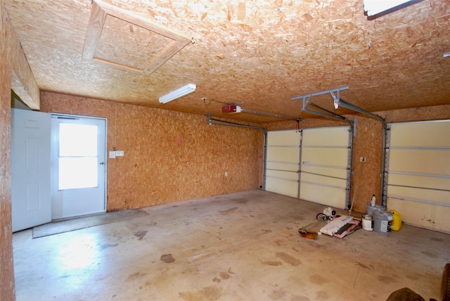 garage featuring a garage door opener