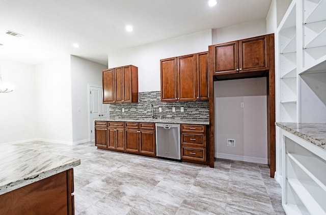 kitchen featuring light stone counters, light tile flooring, dishwasher, backsplash, and sink