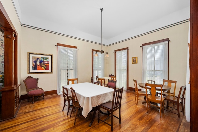 dining room with hardwood / wood-style floors