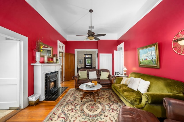 living room featuring ceiling fan and wood-type flooring