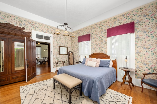 bedroom with light wood-type flooring