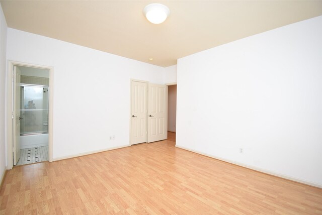 empty room featuring light tile patterned floors