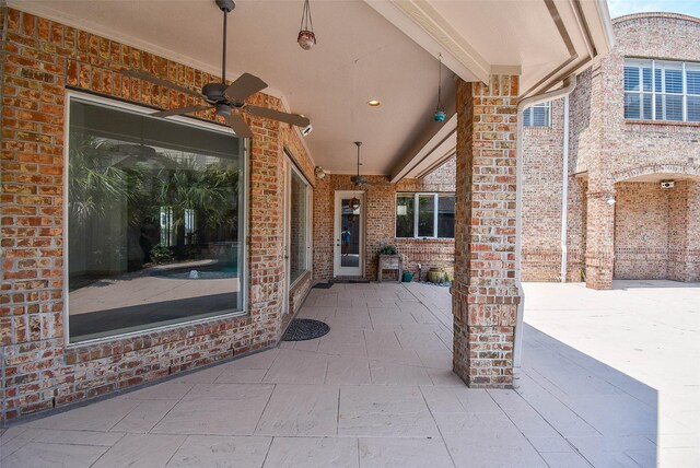 view of patio with ceiling fan