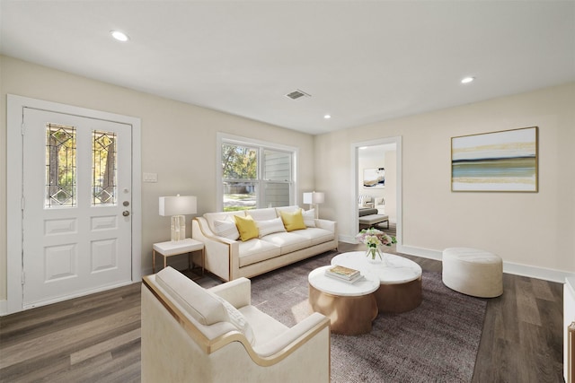 living room featuring dark hardwood / wood-style flooring