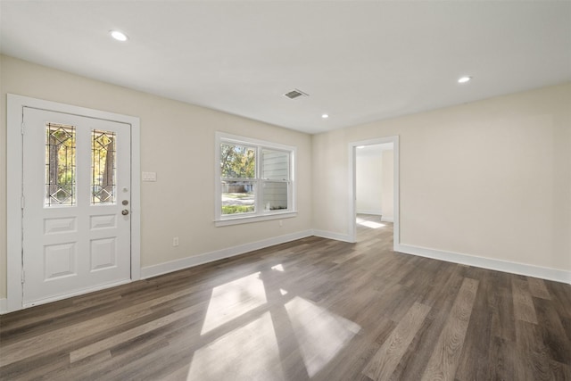 entryway with dark hardwood / wood-style floors