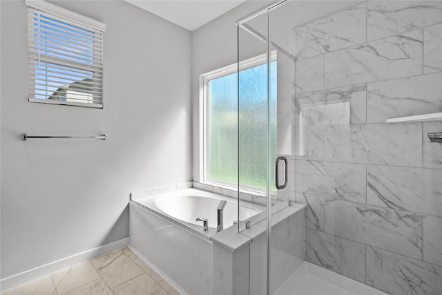 bathroom with independent shower and bath