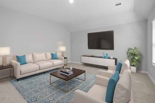 carpeted living room with a wealth of natural light and lofted ceiling