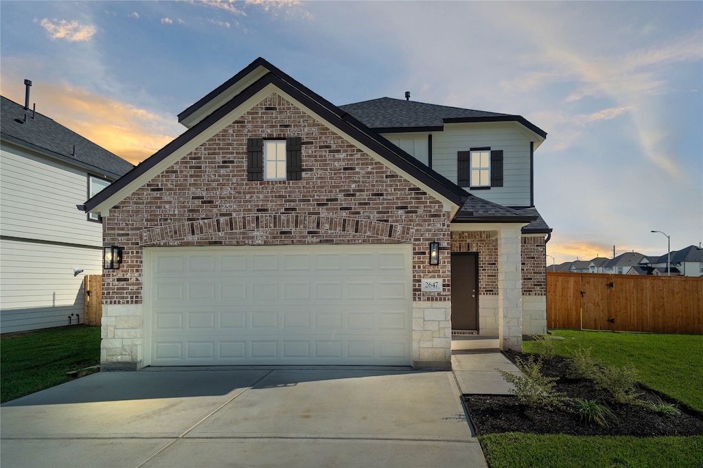 view of front property with a garage