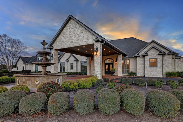 view of french country inspired facade