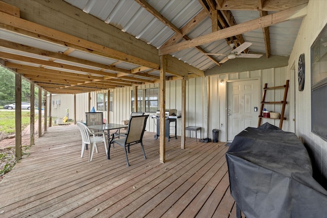 wooden terrace featuring a grill