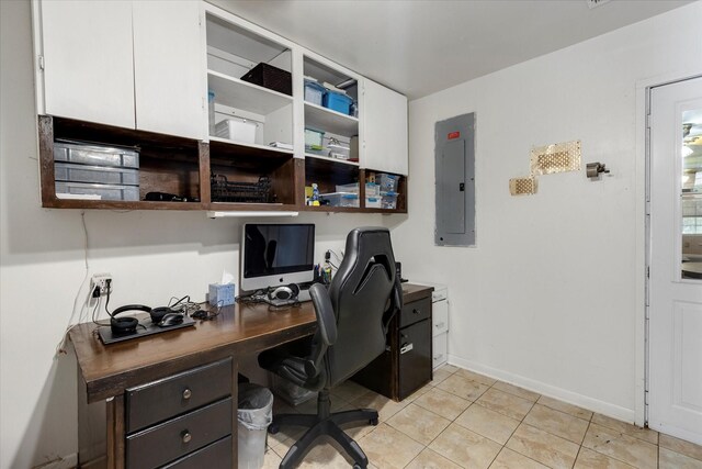 office area featuring built in desk and light tile floors