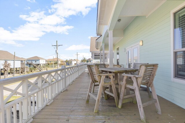 balcony featuring french doors