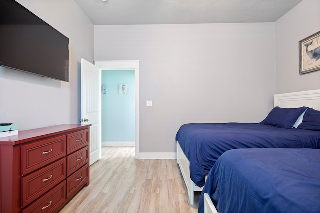 bedroom with light hardwood / wood-style floors