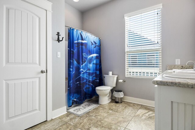 full bathroom featuring vanity, toilet, and shower / bath combo