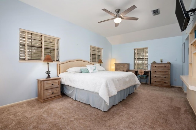 bedroom featuring lofted ceiling, carpet floors, and ceiling fan