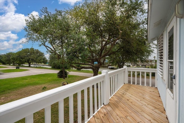 deck featuring a yard