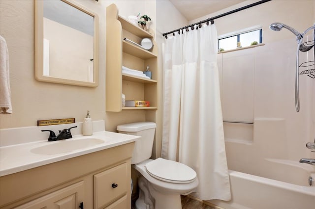 full bathroom featuring shower / bath combination with curtain, large vanity, and toilet