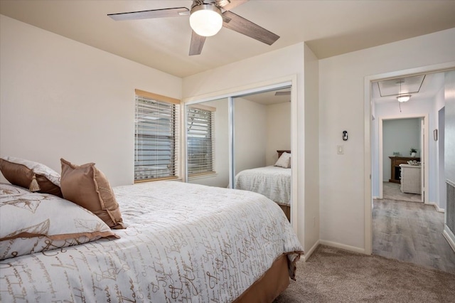 1220 Waterways Dr, Crystal Beach, TX 77650 - carpeted bedroom featuring a closet, ceiling fan, baseboards, and attic access