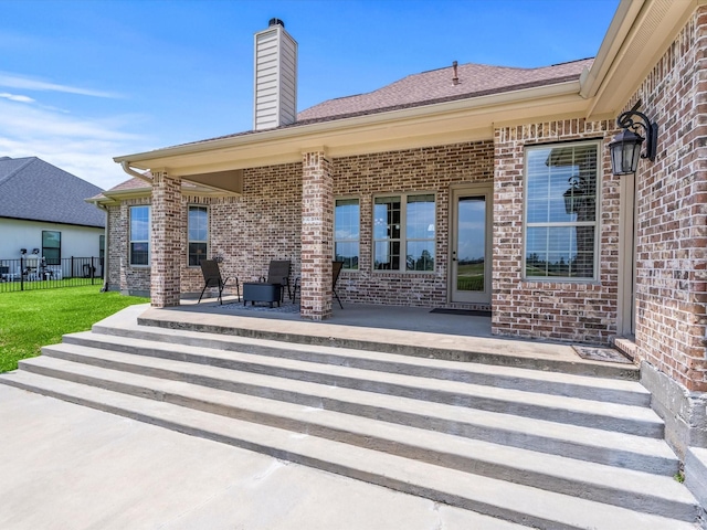 view of patio / terrace with fence