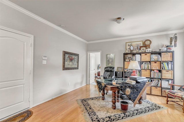 office with wood-type flooring and ornamental molding