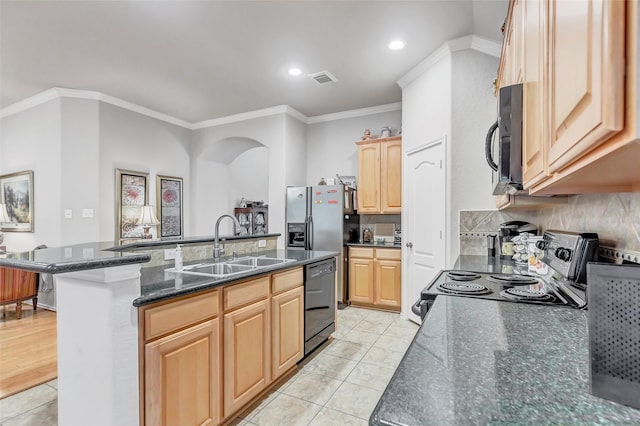 kitchen with sink, black appliances, a center island with sink, light brown cabinetry, and dark stone counters