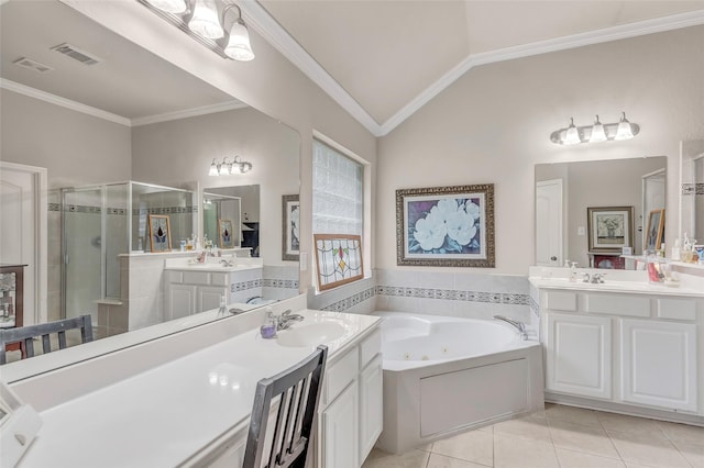 bathroom featuring ornamental molding, lofted ceiling, tile patterned floors, and vanity