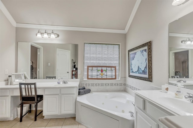 bathroom with vanity, a bathtub, ornamental molding, and tile patterned floors