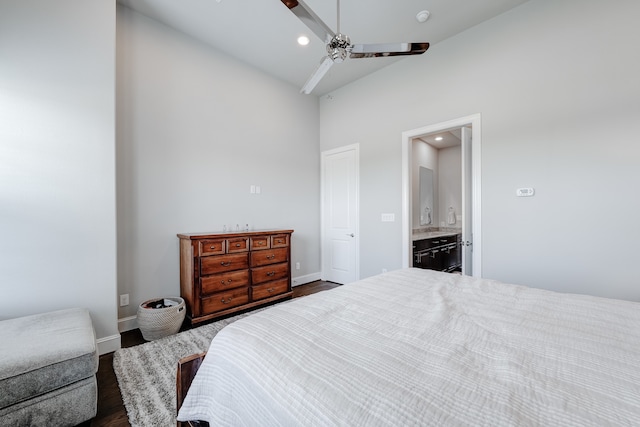 bedroom featuring high vaulted ceiling, ensuite bathroom, ceiling fan, and dark hardwood / wood-style flooring