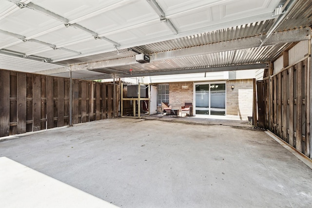 garage featuring a garage door opener