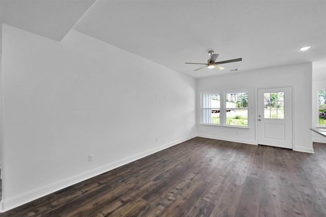 interior space featuring ceiling fan and dark wood-type flooring