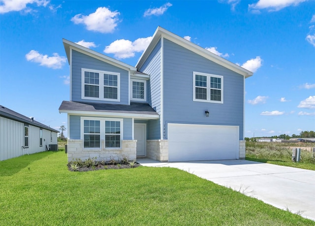 view of front of house featuring a front lawn, a garage, and central AC