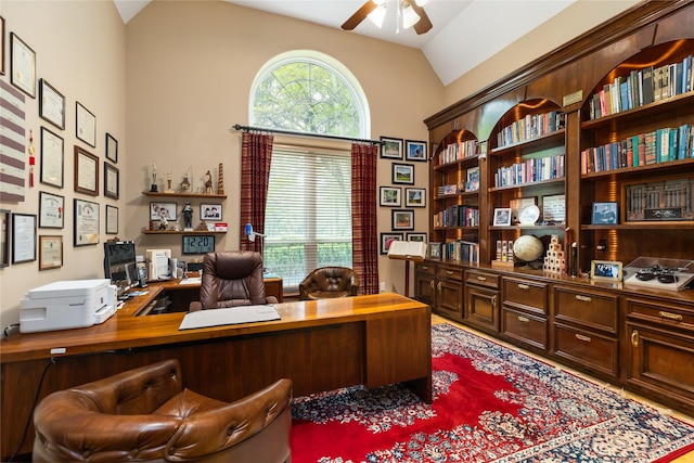 office space featuring ceiling fan and vaulted ceiling