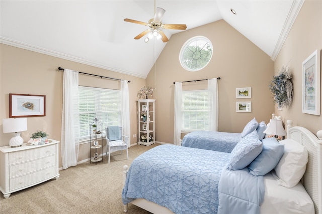 bedroom with ceiling fan, light colored carpet, ornamental molding, and vaulted ceiling