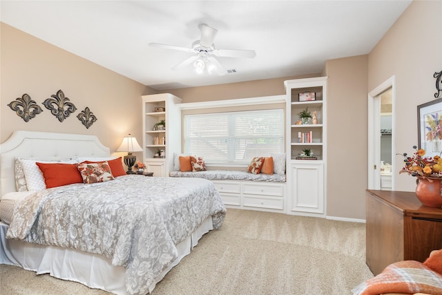 carpeted bedroom with ceiling fan