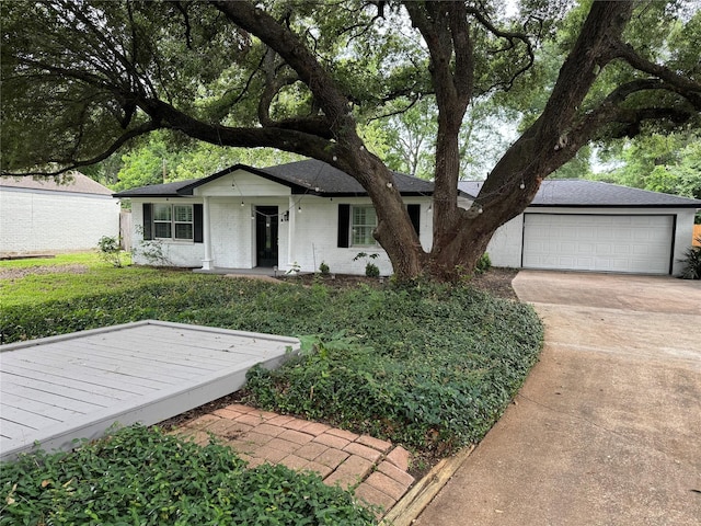 single story home with a garage