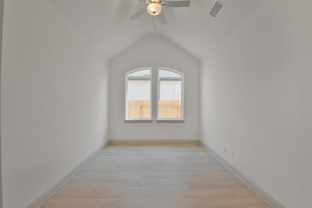 13318 Pine Lake Bnd, Tomball, TX 77375 - empty room featuring ceiling fan, light wood-type flooring, and vaulted ceiling