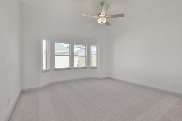 13318 Pine Lake Bnd, Tomball, TX 77375 - empty room with ceiling fan and light colored carpet
