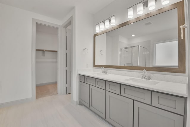 13318 Pine Lake Bnd, Tomball, TX 77375 - bathroom with vanity and a shower with shower door